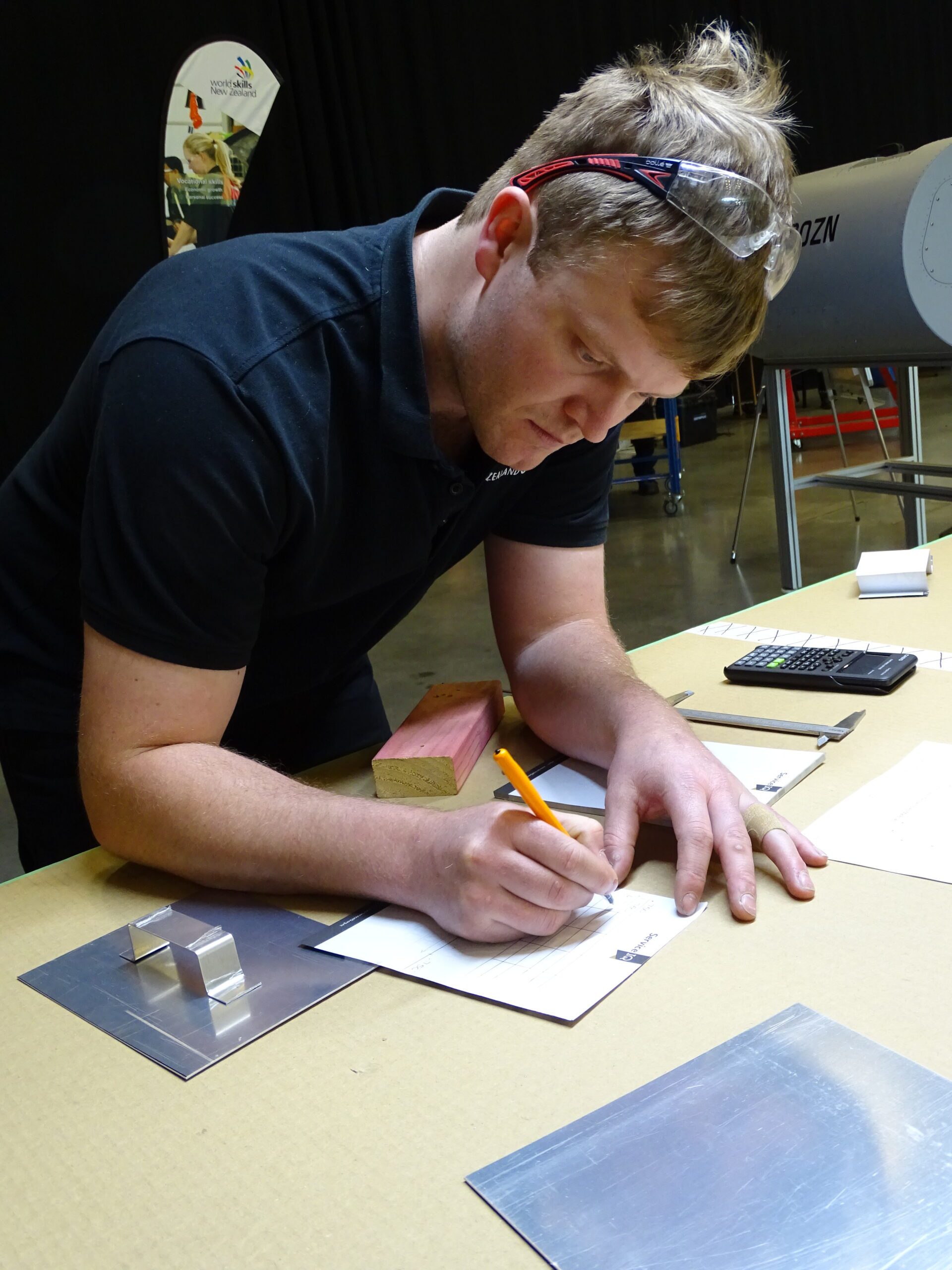 DSC01590 Elliott Farnan carrying out a daily inspection on a Mitsubishi MU2 aircraft