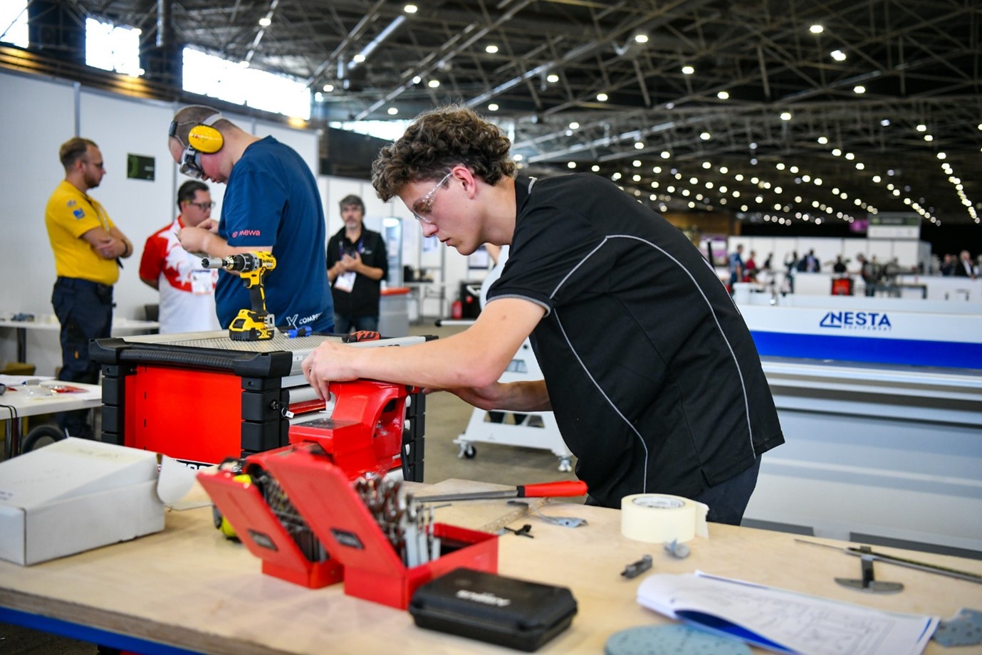 Elliott Farnan, New Zealand representative for Aircraft Maintenance, on the tools during the WorldSkills Competition in Lyon. 