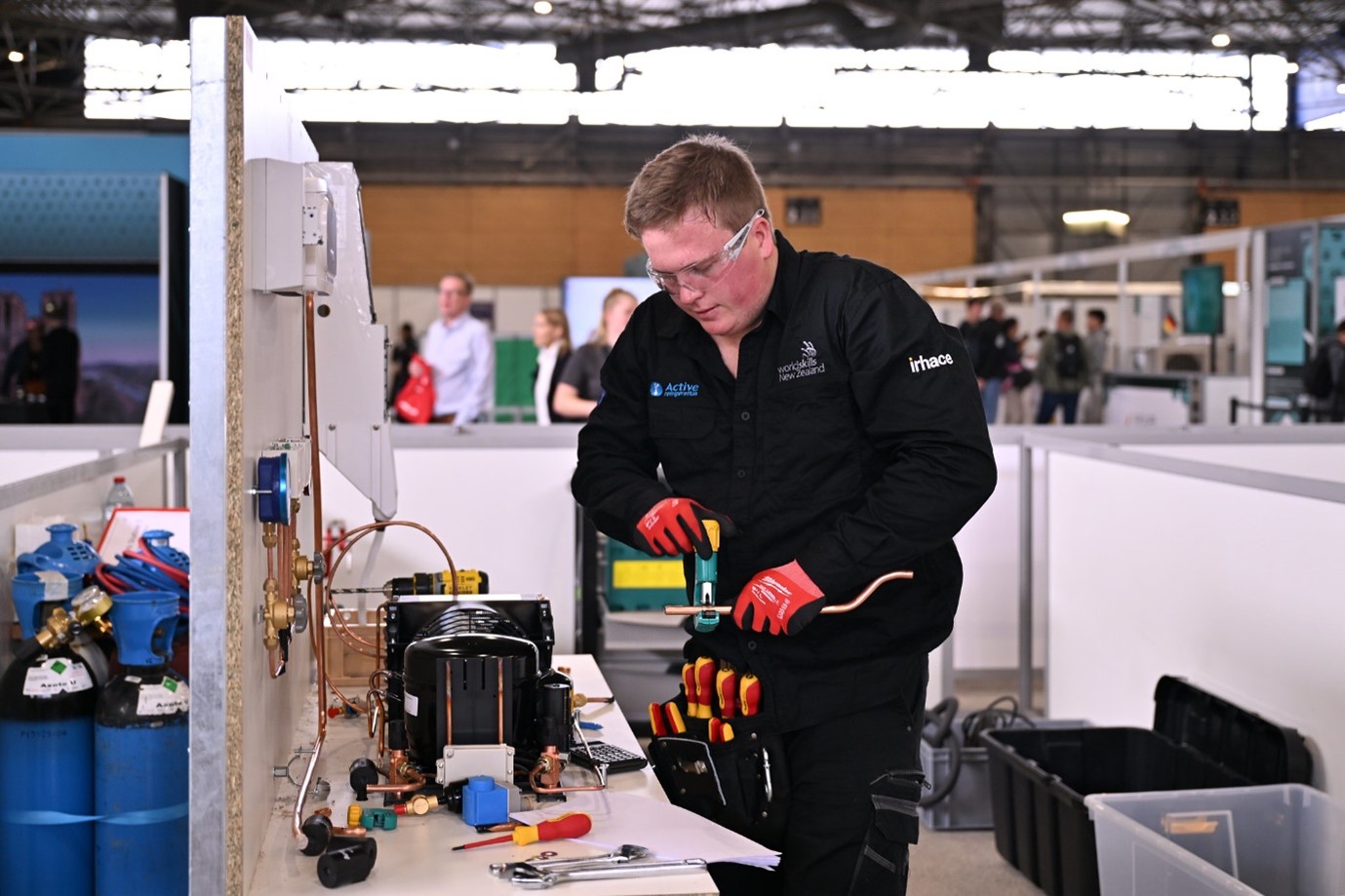 Jack Butler, New Zealand representative for Refrigeration and Air Conditioning, on the tools during the WorldSkills Competition in Lyon